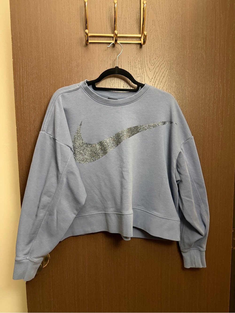 Nike Women’s Light Blue Cropped Crew Sweatshirt with Glitter Swoosh